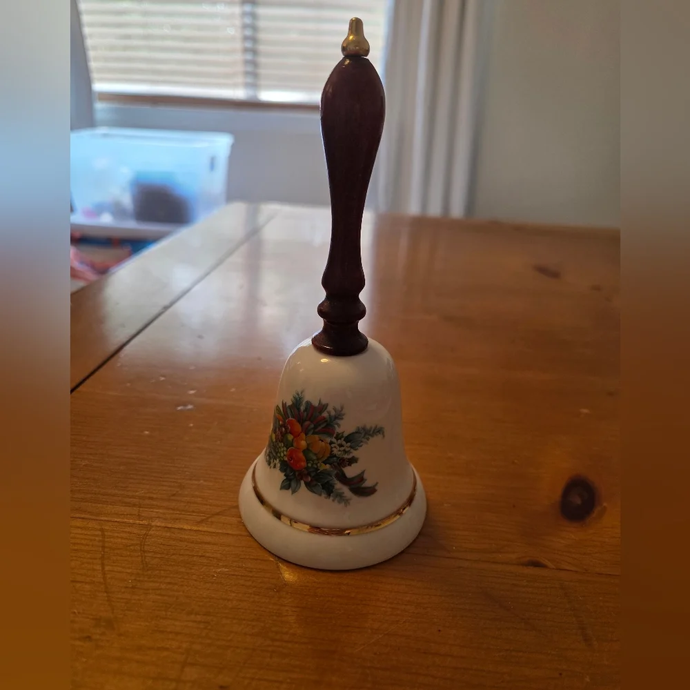 Avon 1985 Porcelain Holiday Bell With Wooden Handle